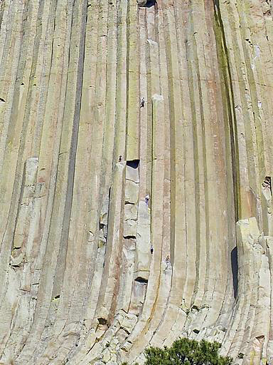 Climbers on Tulgey Wood (5.10a), and McCarthy West Face - Free Variation (5.10b), Devils Tower, Wyoming