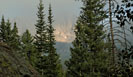 View of Mount Alice breaking through the early morning mist
