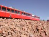 COG rail train arriving at the Pikes Peak summit