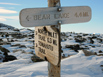 Trail junction sign in the Flattop Mountain summit area