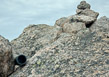 Photo of the summit register canister and the summit Cairn on Pagoda Mountain