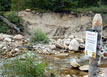 Sign warning that the bridge is out at the start of the Ypsilon Trail on the Roaring River, RMNP