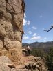 Scenic view of climber starting up Sonic Youth in the Bank area at shelf road