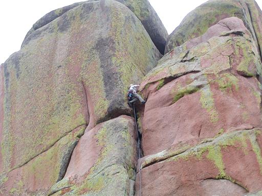 Taken by John Benson, pulling the crux move on MRC Left, at Vedauwoo, Wyoming
